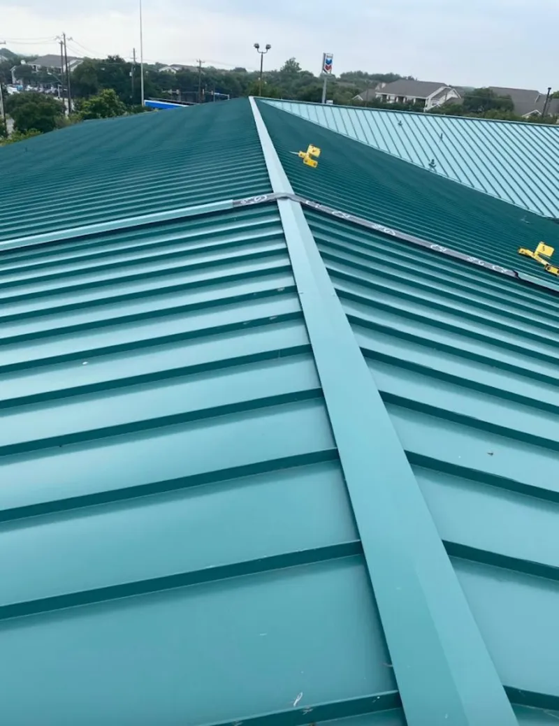 Green commercial metal roof ridge and valley for Metal Roof Repair in Texas City